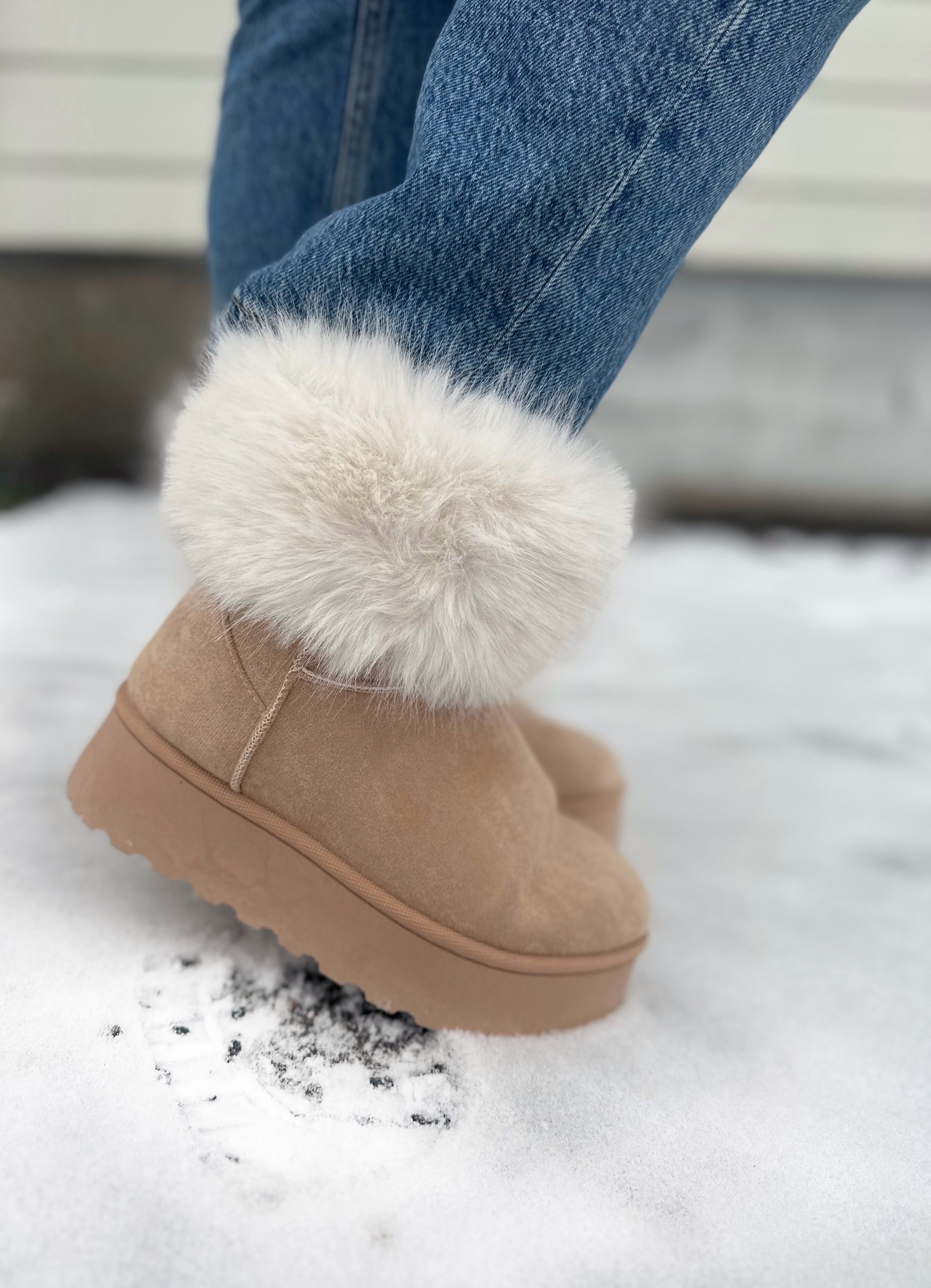 Furry boots sales with pom poms